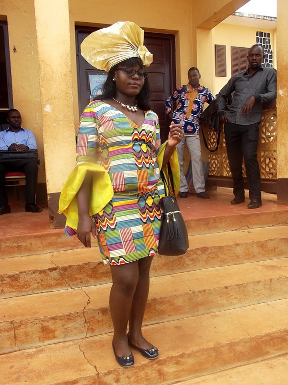 Terracotta structured aso-oke gown with gele